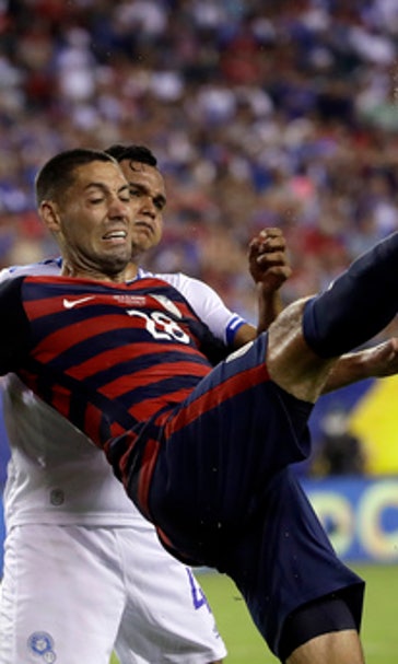 US survives bites, tops El Salvador 2-0 to advance